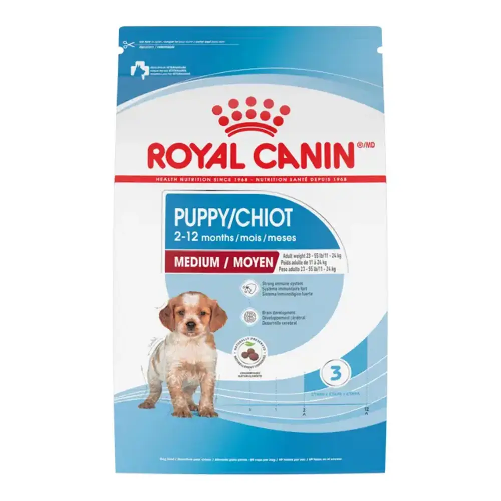 Royal Canin Medium Puppy dry dog food bag for puppies up to 12 months with an adult weight of 23-55 lbs, highlighting brain and immune support. Royal Canin Medium Puppy dry dog food bag for puppies up to 12 months with an adult weight of 23-55 lbs, highlighting brain and immune support.